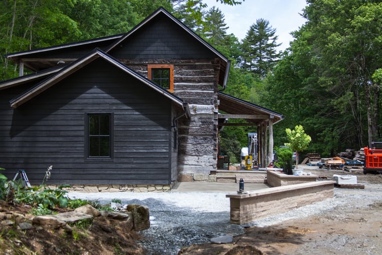 The luxury farmhouse cabins at Flat Mountain Farm underwent renovations including a hardscape makeover with Polycor stone